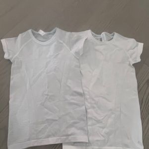 Two ivivva youth white tennis shirts